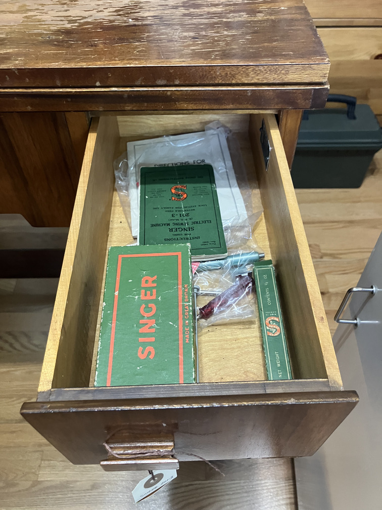 Drawer with manuals and accessories